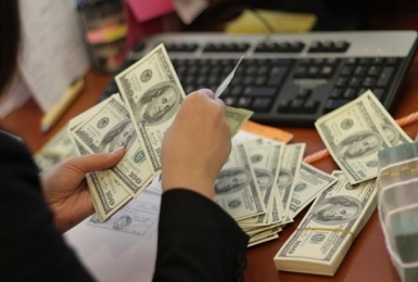 Khai thuế, nộp thuế bằng ngoại tệ tự do chuyển đổi được phép thực hiện trong trường hợp nào?